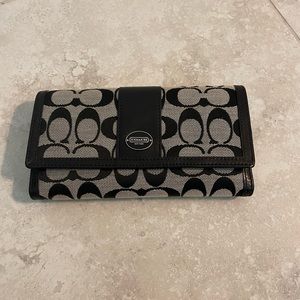 Black and gray trifold long Coach wallet